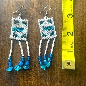 Beaded dangly earrings made by Indigenous jewelry-maker